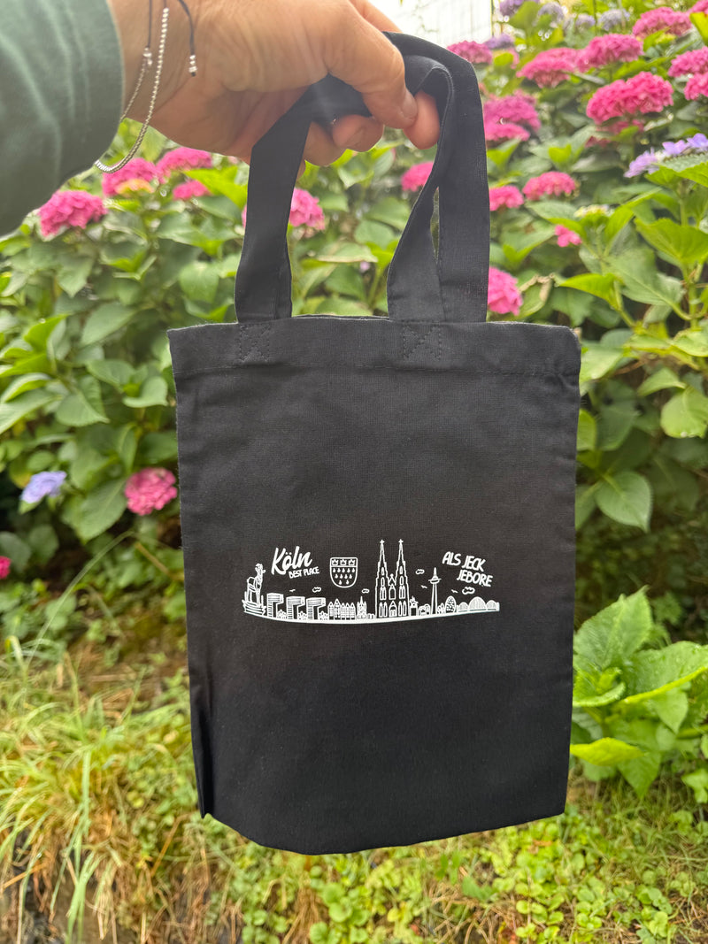 Kleine Stofftasche Schwarz – „ALS JECK JEBORE“ mit Skyline