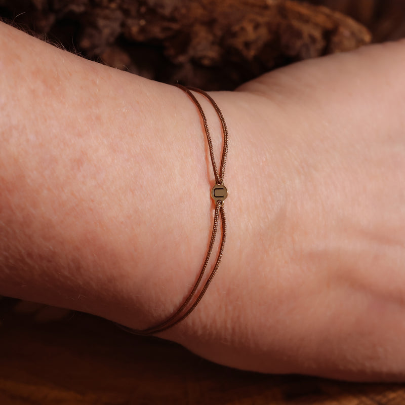 Nylon-Armband mit Buchstabe aus 750 Gelbgold