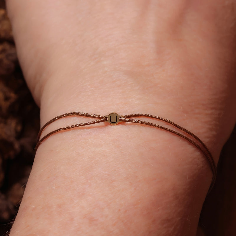 Nylon-Armband mit Buchstabe aus 750 Gelbgold