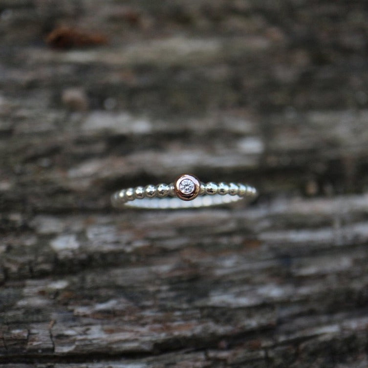Beisteckring mit einem 0,03ct Diamant