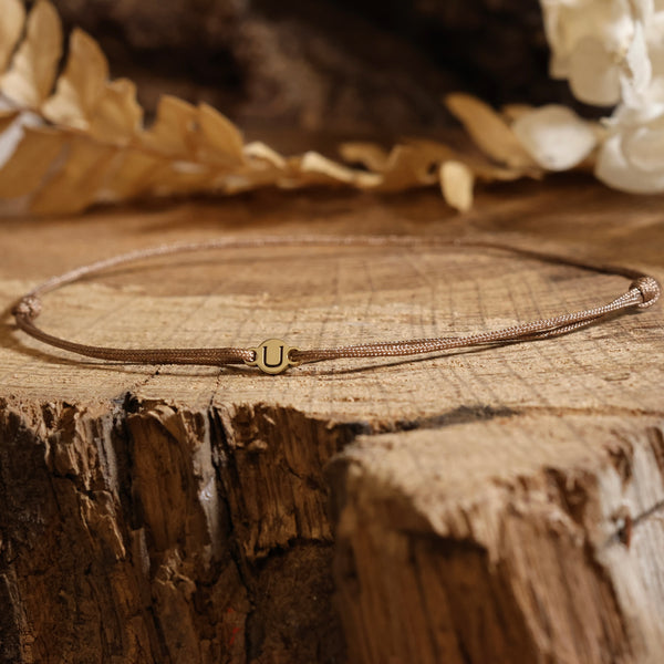 Nylon-Armband mit Buchstabe aus 750 Gelbgold