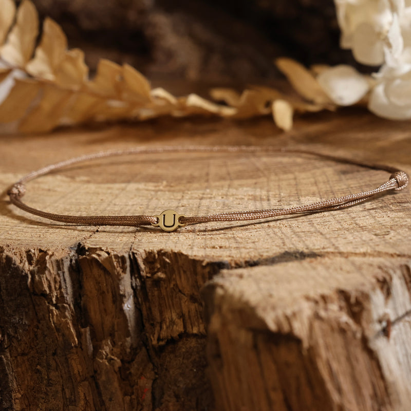 Nylon-Armband mit Buchstabe aus 750 Gelbgold