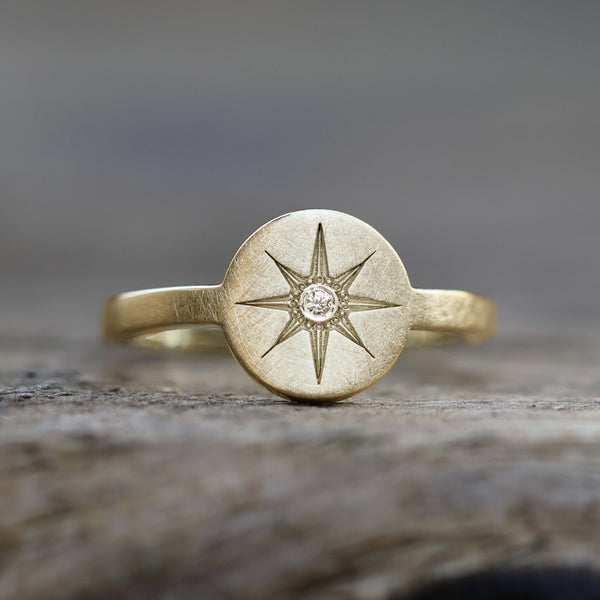 Sternring in Gelbgold mit Diamant