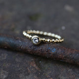 Beisteckring Kügelchen mit einem 0,11 ct Diamant