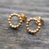 Kugelring-Ohrringe aus Gold