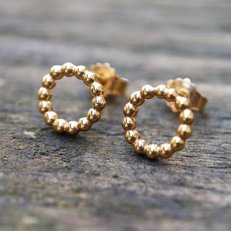 Kugelring-Ohrringe aus Gold